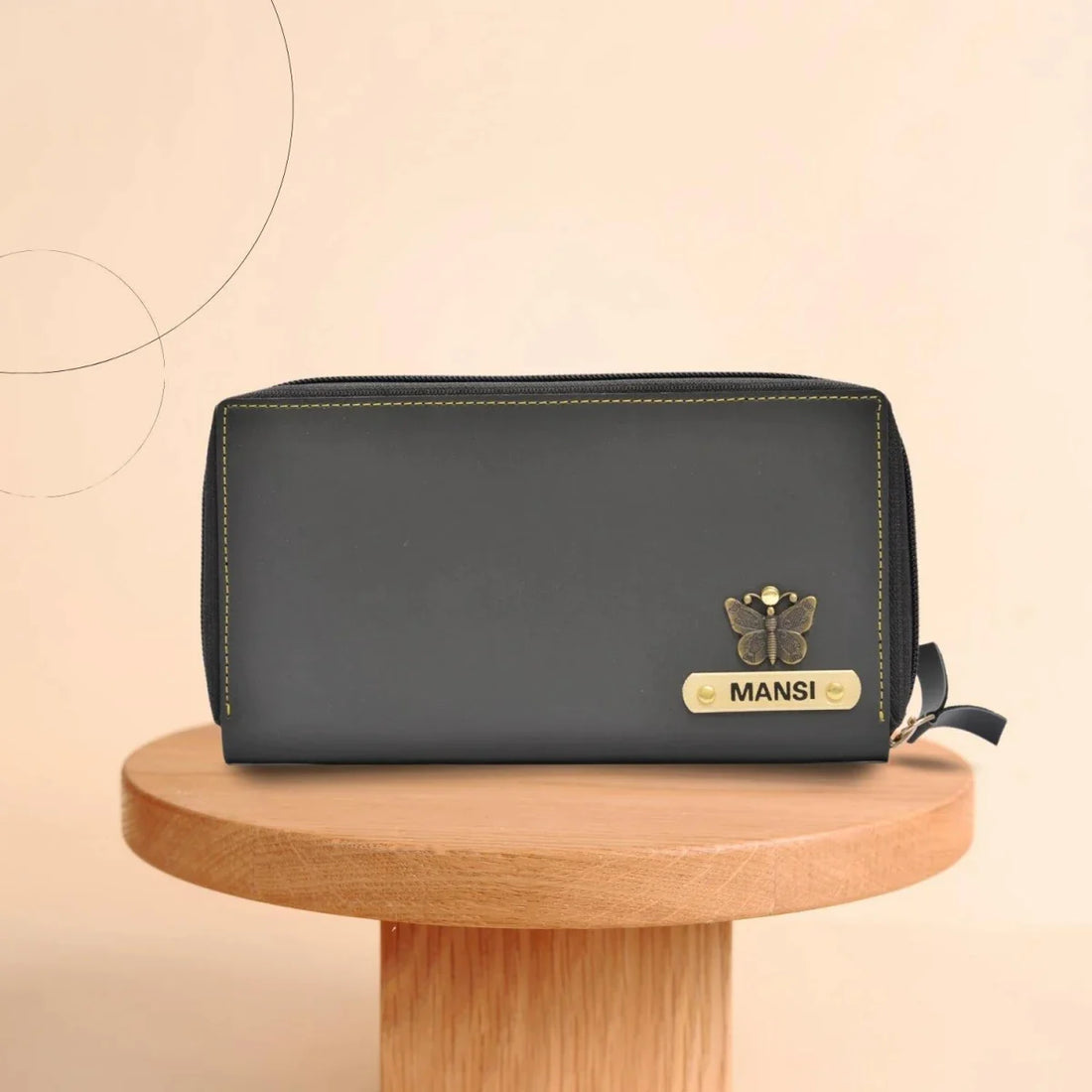 "Effortless Charm: Our zip around clutch exudes a charming appeal, effortlessly elevating your outfit with its simple yet elegant design."