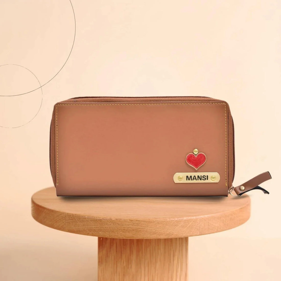 "Timeless Elegance: The clean lines and timeless design of our zip around clutch make it a classic addition to any wardrobe."