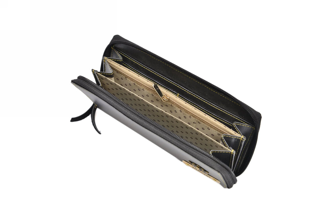 "Effortless Charm: Our zip around clutch exudes a charming appeal, effortlessly elevating your outfit with its simple yet elegant design."
