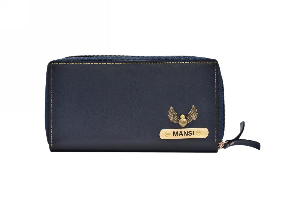 "Compact and Essential: Our zip around clutch offers a compact solution to carry your essentials, without compromising on style or convenience."