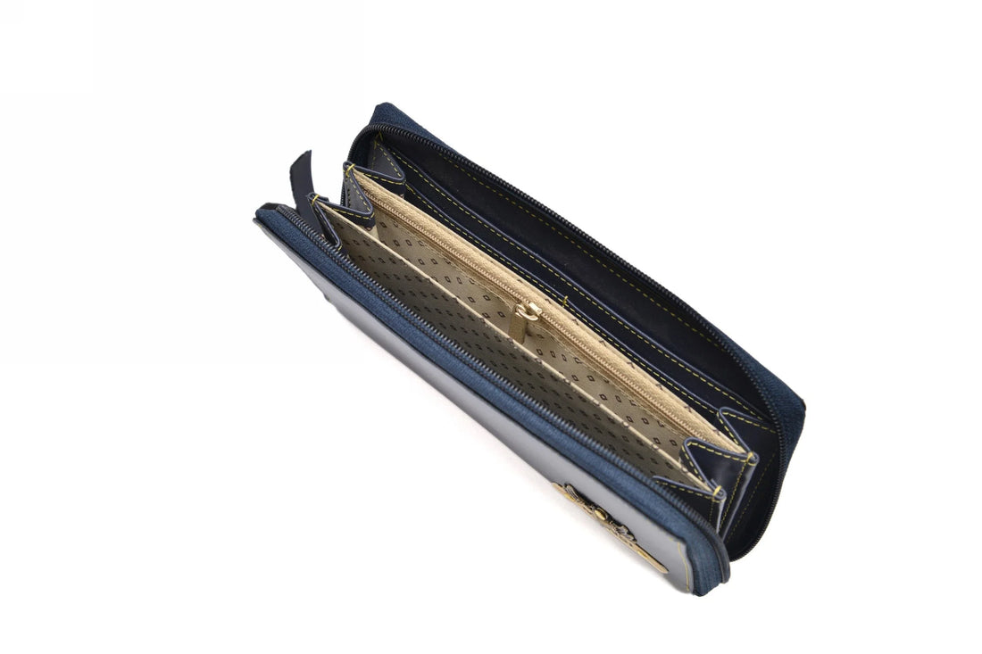 "Minimalist Chic: Embrace the beauty of simplicity with our zip around minimal clutch, designed to complement your refined sense of style."