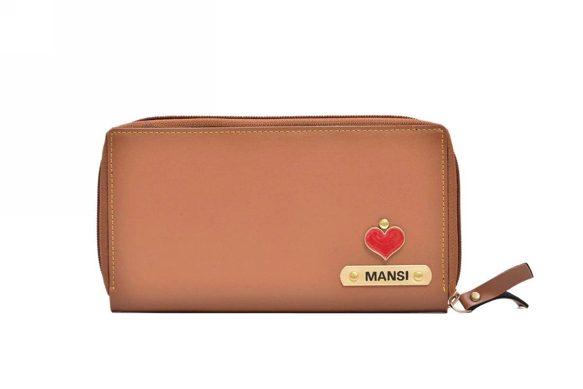 "Fashionably Practical: Our zip around minimal clutch combines style and functionality, allowing you to carry your essentials with ease and flair."