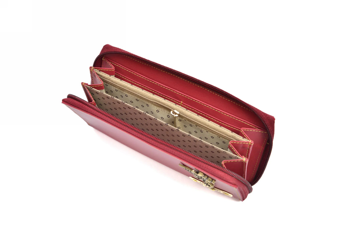 "Effortless Versatility: Our zip around minimal clutch seamlessly transitions from day to night, making it the perfect accessory for any occasion."