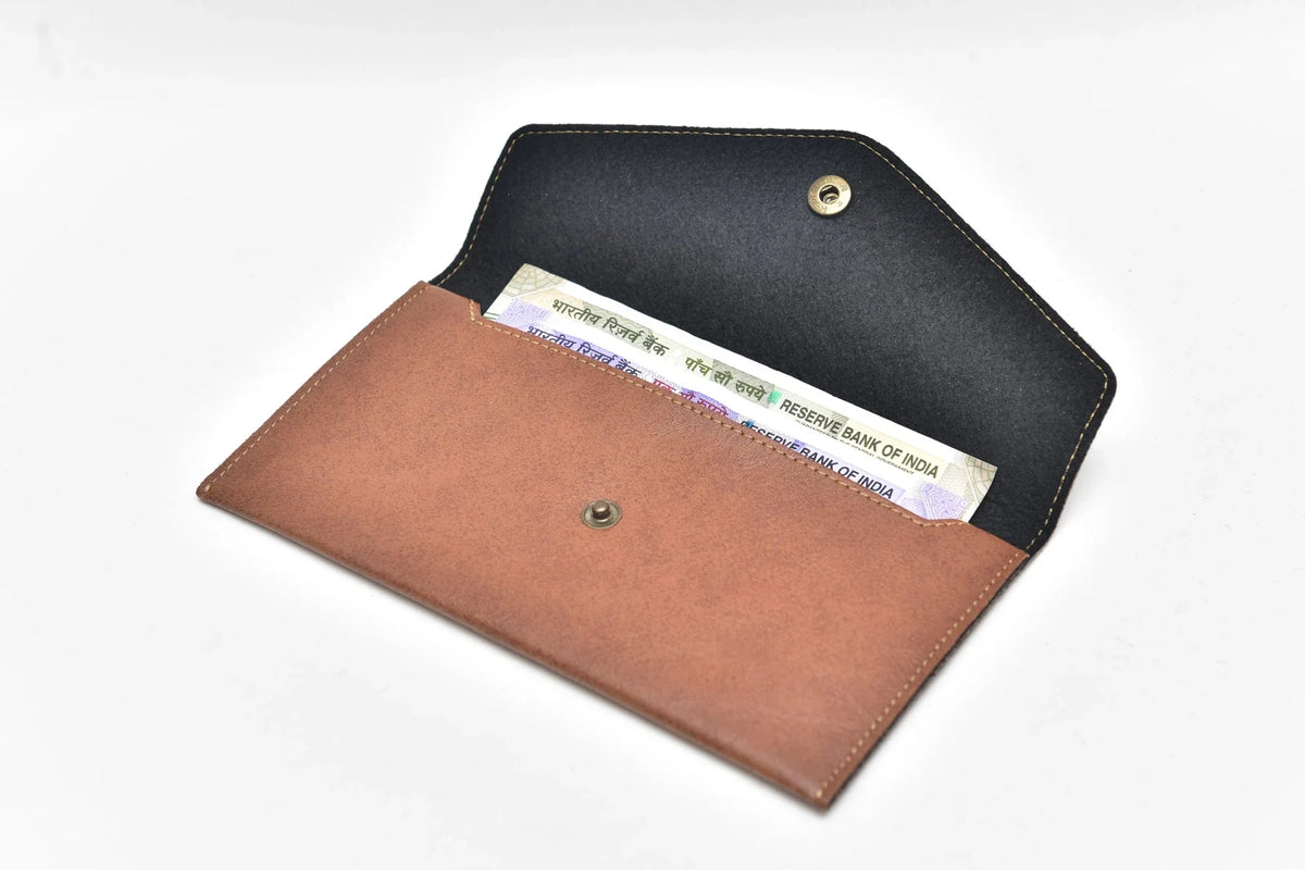 Inside or open view of tan minimal clutch