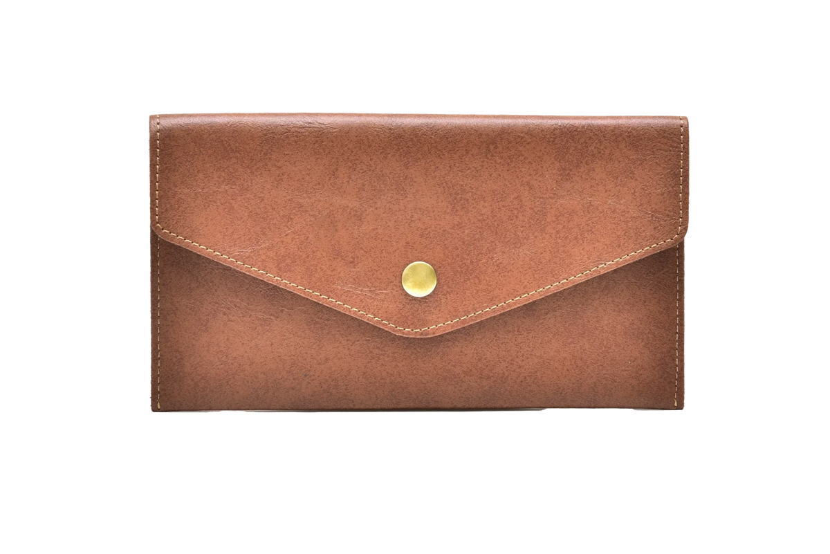 Tired of carrying bulky bags and purses? Switch to minimal clutches that not only feel light but look elegant too. Our clutches will keep your belongings safe and add the extra wow factor to your outfit. Be it your party night or a business meeting, flaunt your clutch that comes in a variety of colours.